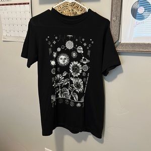 Oversized black tee with graphic design.